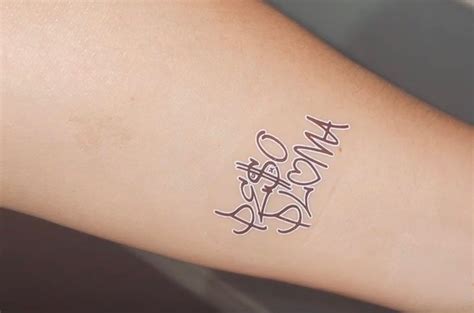 peso pluma neck tattoos|Peso Pluma: The Heavyweight of Corridos .